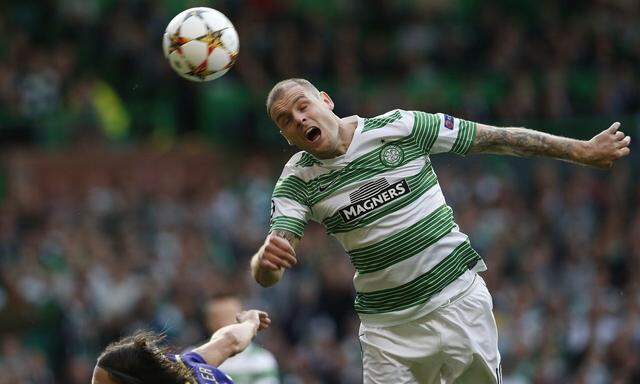 Celtic's Stokes challenges NK Maribor's Suler during their Champions League soccer match in Celtic Park Stadium, Glasgow