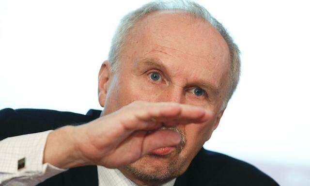 OeNB Governor Nowotny briefs the media during a news conference in Vienna