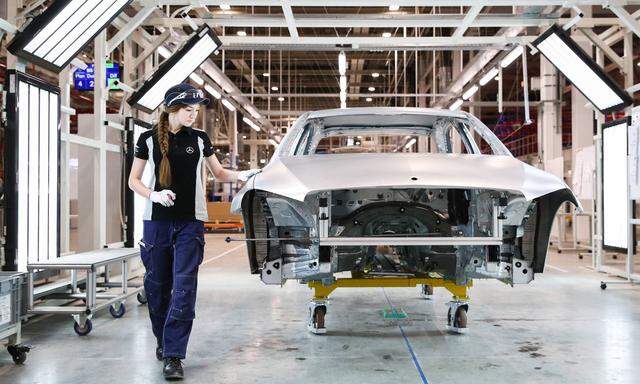 MOSCOW REGION RUSSIA APRIL 3 2019 A worker in an assembly room of a Mercedes Benz plant of the