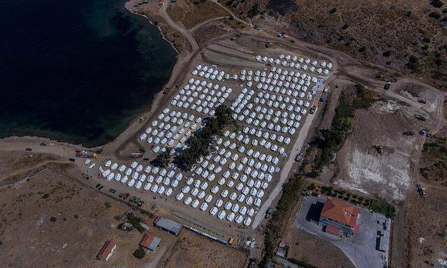 (200914) -- LESVOS, Sept. 14, 2020 -- Aerial photo taken on Sept. 14, 2020 shows new tents for relocating migrants and