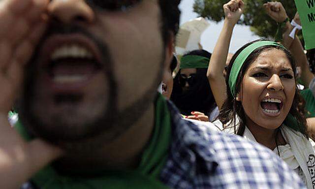 Protesters chant during a protest over the outcome of the presidential election in Iran in the Westwo