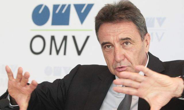 OMV CEO Roiss gestures during news conference in Vienna