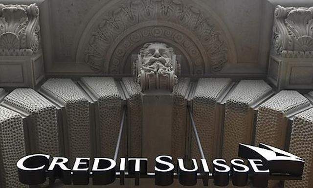 A logo is seen on the main entrance of the headquarters of Swiss bank Credit Suisse at the Paradeplat