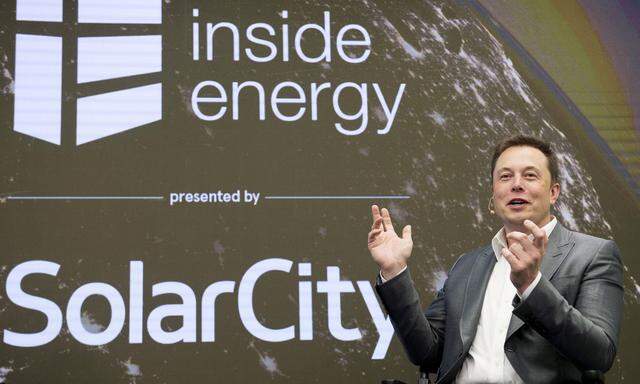 FILE PHOTO: Elon Musk, Chairman of SolarCity and CEO of Tesla Motors, speaks at SolarCity's Inside Energy Summit in Midtown, New York