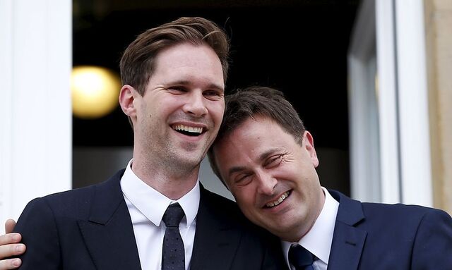 Luxembourg's PM Bettel poses with his partner Destenay after their wedding ceremony at Luxembourg's city hall