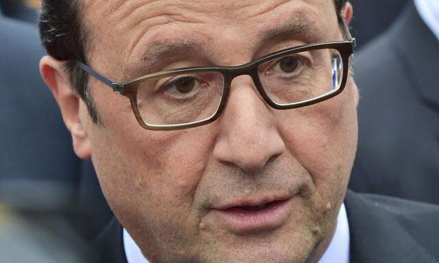 France's President Hollande arrives for a conference on jobs in Milan