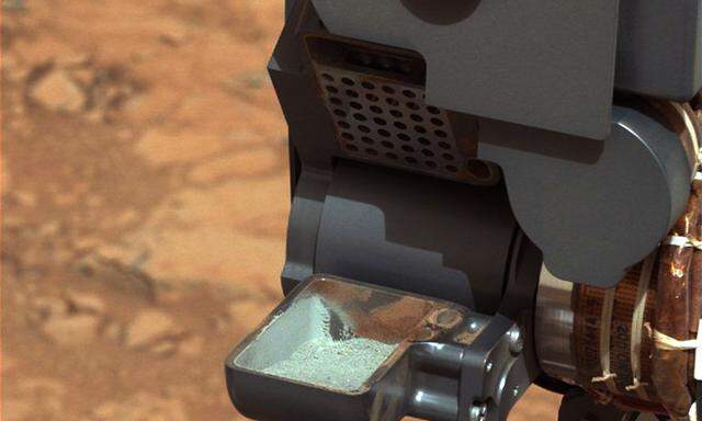 The first sample of powdered rock from Mars extracted by the NASA's Curiosity rover drill is pictured in this NASA handout photo
