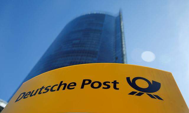 FILE PHOTO: A Deutche Post sign stands in front of the Bonn Post Tower in Bonn