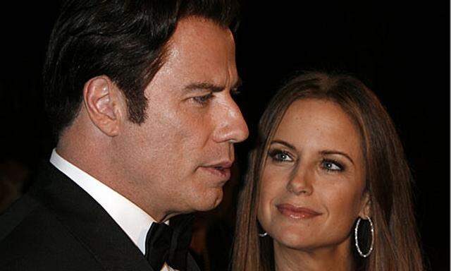 Hollywood-tar John Travolta und seine Frau Kelly Preston.