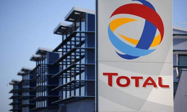 File photo of the logo of French oil giant Total in front of the oil refinery of Donges