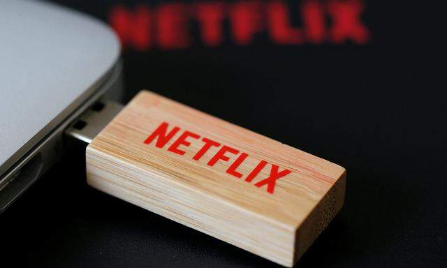 FILE PHOTO: An USB key with the logo of Netflix the American provider of on-demand Internet streaming media is seen in Paris