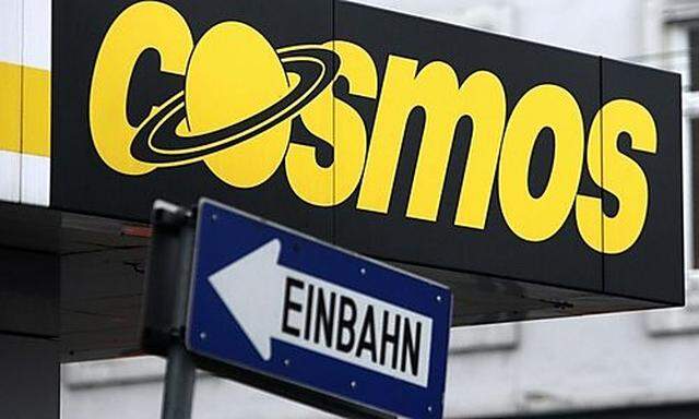The logo is placed behind a traffic sign on a store of Austrian electronic trade chain Cosmos in Vien