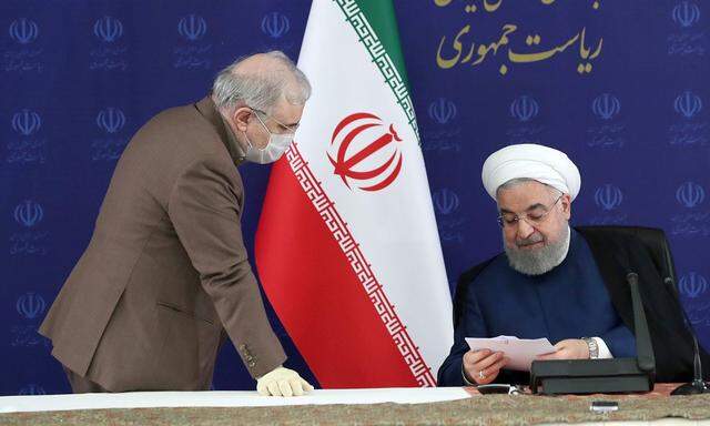 Irans Präsident Hassan Rouhani (rechts)
