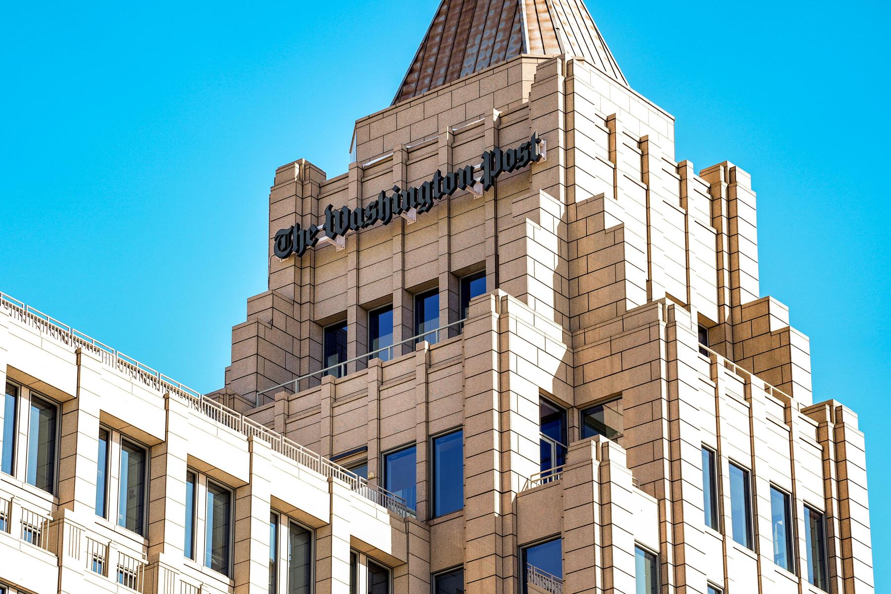 Publisher of The Washington Post steps down after wave of layoffs