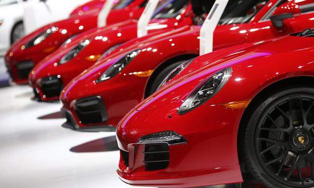 Various Porsche cars are displayed during the second press day of the North American International Auto Show in Detroit
