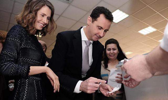 Bashar al-Assad mit seiner Frau Asma
