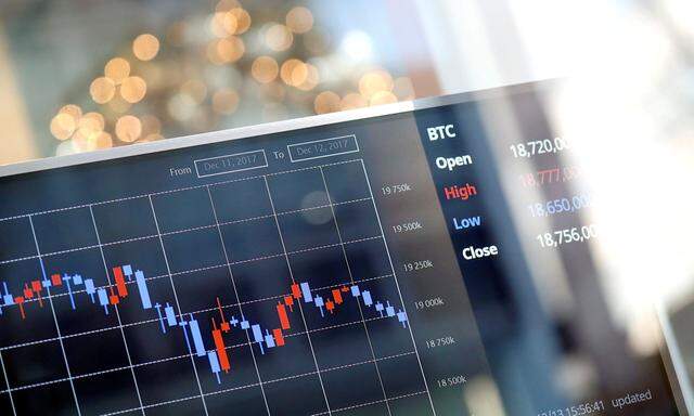 FILE PHOTO: An electric board showing exchange rate between South Korean Won and Bitcoin at a cryptocurrencies exchange in Seoul