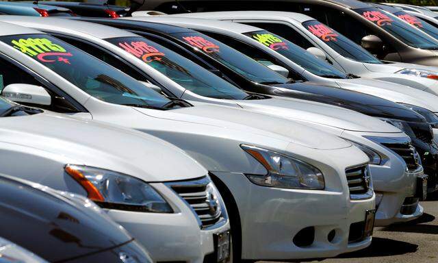 Automobiles are shown for sale at a car dealership in Carlsbad, California