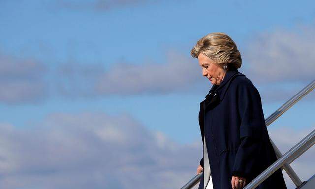 U.S. Democratic presidential nominee Hillary Clinton gets off her campaign plane in Moon