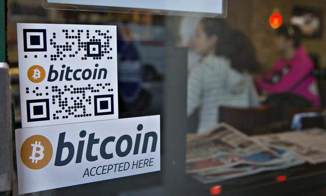 File photo shows advertisement  for bitcoin ATM machine in Vancouver