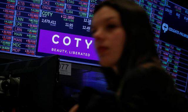 FILE PHOTO: A screen displays the logo and trading information for Coty Inc at the NYSE in New York