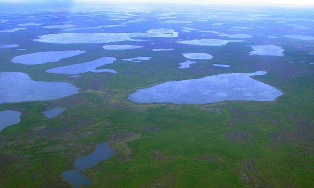 FILE PHOTO: An aerial view shows thermokarst lakes outside the town of Chersky in northeast Siberia