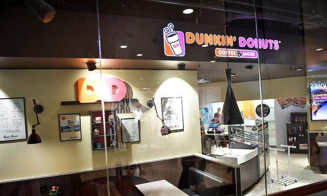 An empty Dunkin' Donuts cafe is seen in a shopping mall in central Stockholm