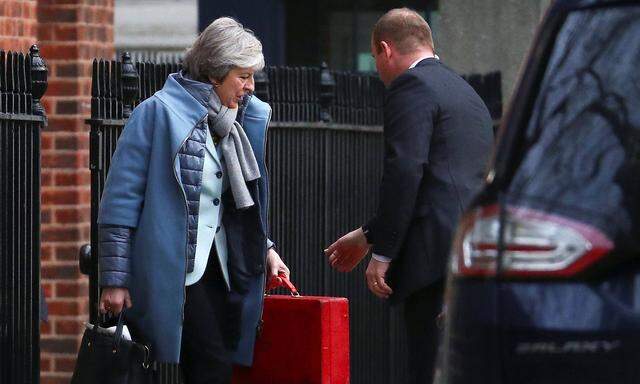 Britain's Prime Minister Theresa May leaves Downing Street, London