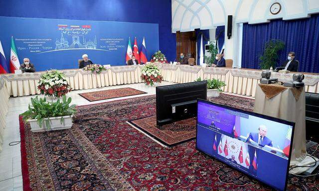 Irans Präsident Hassan Rohani bei der Videokonferenz mit Putin und Erdogan.