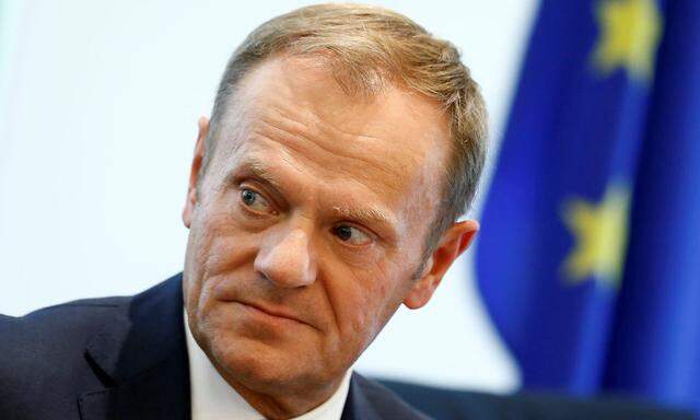 European Council President Donald Tusk attends a news conference at the Delegation of the European Union to China in Beijing