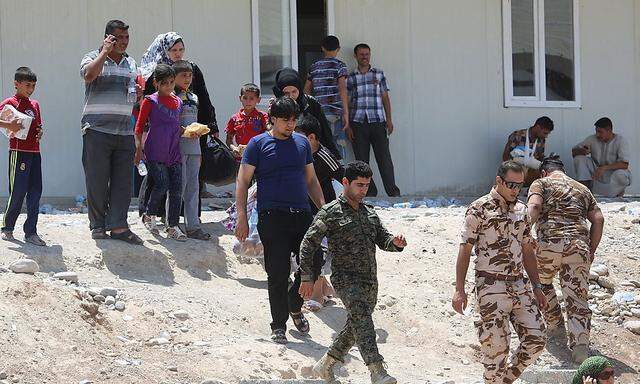 Menschen flüchten vor der ISIS