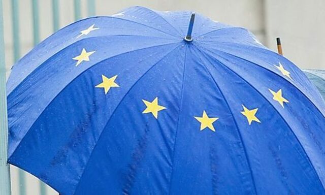 A man enters the chancellery in Berlin before talks between government and opposition leaders about the EU fiscal pact