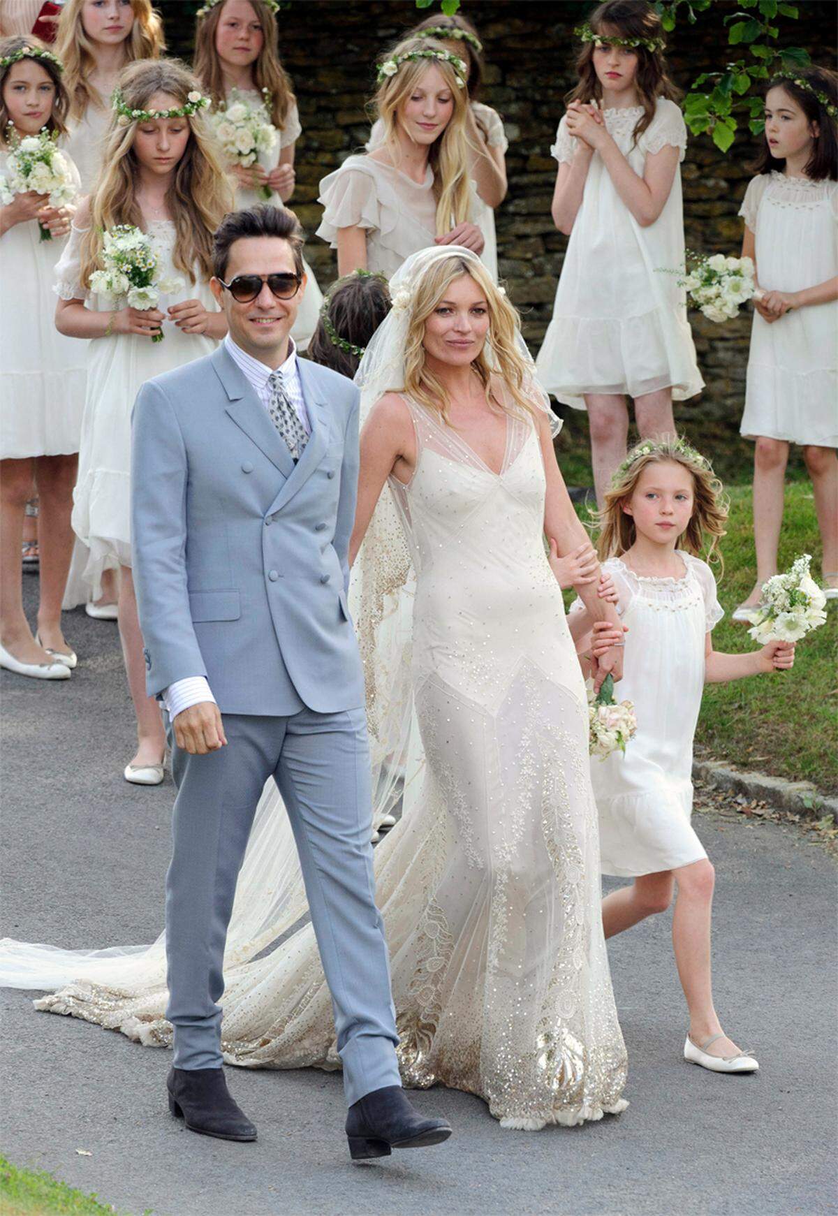 Kate Moss war im Zuge ihrer Hochzeit in einer Vogue-Fotostrecke mit Töchterchen Lila Grace zu sehen.