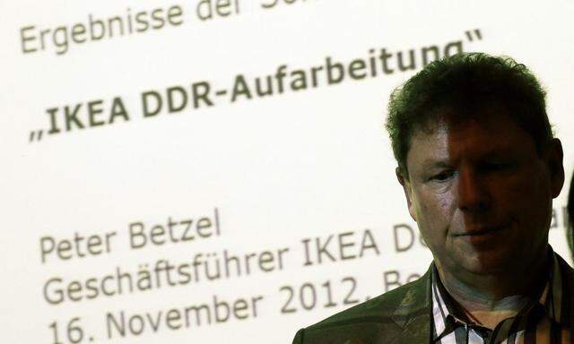 Head of IKEA Germany Betzel presents study on IKEA's possible use of East German political prisoners in production of furniture at news conference in Berlin