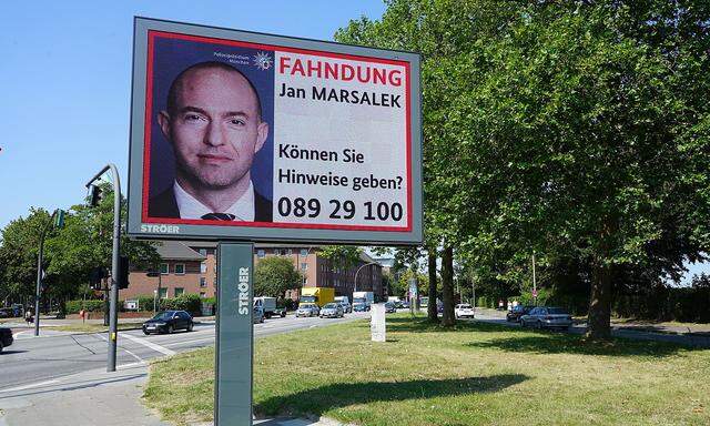 Economic fraud at Wirecard: search for fugative manager Jan Marsalek on a large poster, Hamburg, Germany - 13 Aug 2020