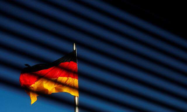 The German flag is pictured at the Reichstag building during exploratory talks about forming a new coalition government in Berlin