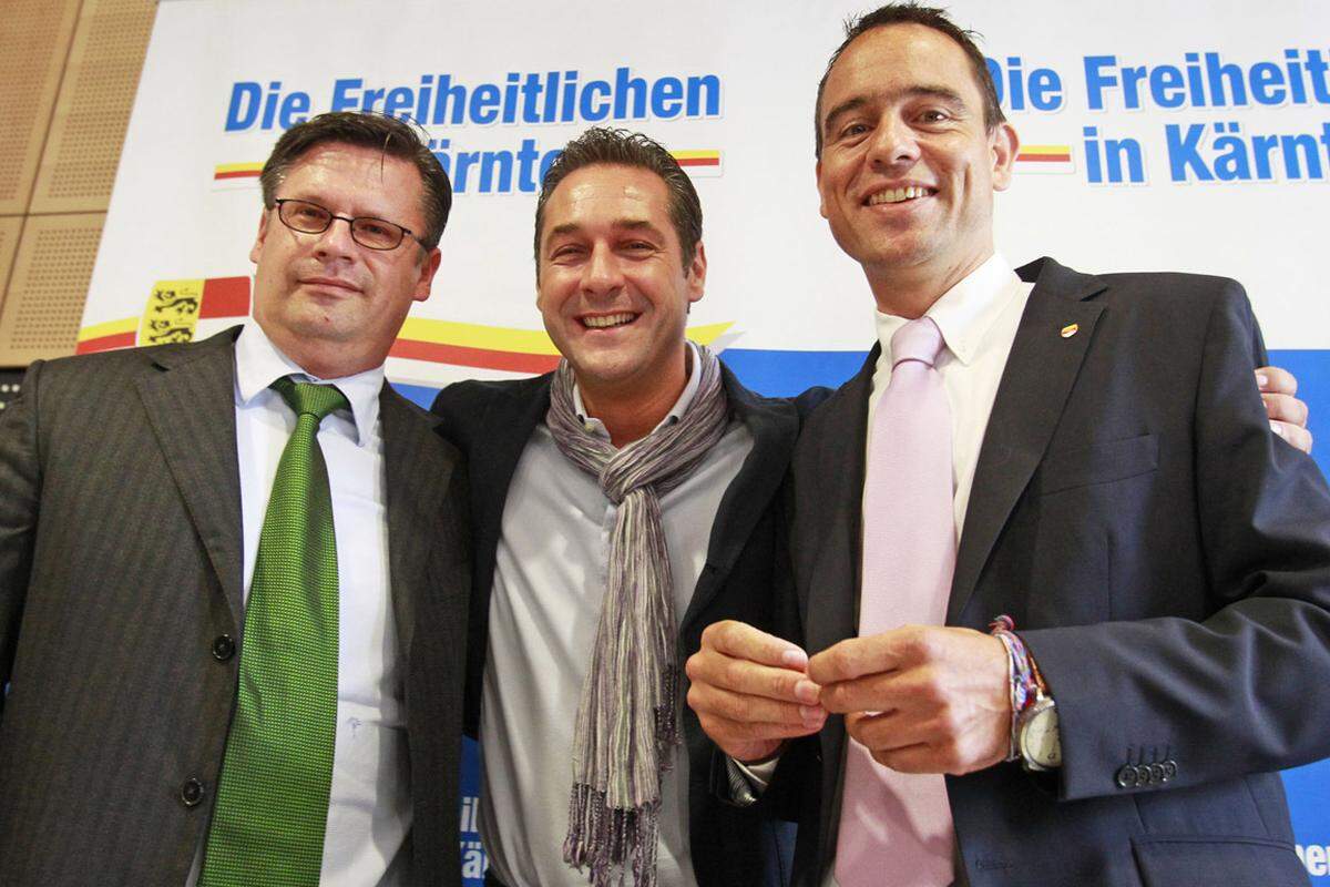 Die Freiheitlichen blieben aber nicht lange orange: Am 16. Dezember 2009 fusionierten sie mit der Bundes-FPÖ. Die neue "Schwesterpartei" heißt seither FPK, die Klubs im Nationalrat wurden zusammengelegt. Das BZÖ gründete sich in Kärnten neu, erlangte auf Landesebene aber keine Rolle. Auch die Landes-FPÖ existierte offiziell als eigene Partei weiter. (Am Bild: Leyroutz, FPÖ-Chef HC Strache und FPK-Obmann Uwe Scheuch)