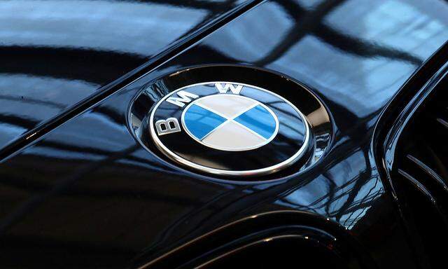 FILE PHOTO: A logo of German luxury carmaker BMW, is seen ahead of the company's annual news conference in Munich