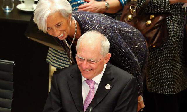 FILE PHOTO: German Finance Minister Wolfgang Schaeuble talks to IMF Managing Director Christine Lagarde during the G20 Finance Ministers and Central Bank Governors Meeting in Baden-Baden