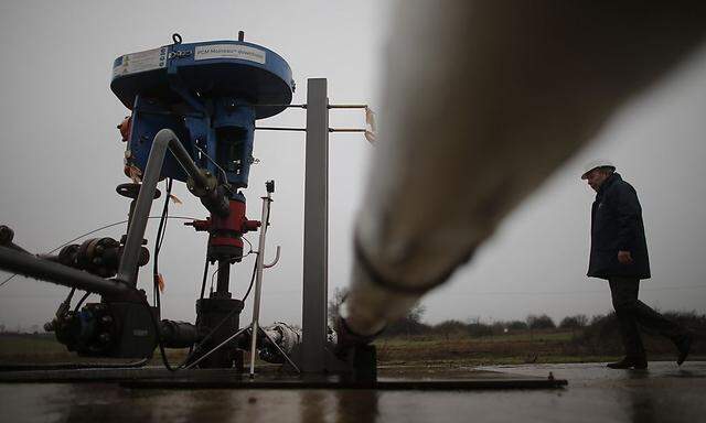 An employee of European Gas Limited works on British company's coalbed methane exploration site outside Folschviller