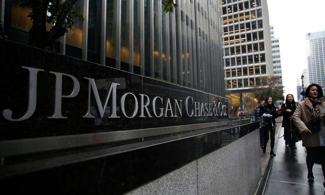 FILE PHOTO: A sign of JP Morgan Chase Bank is seen in front of their headquarters tower in New York