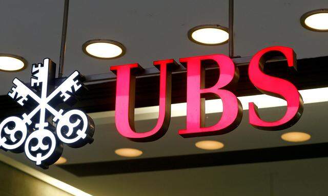 FILE PHOTO: The logo of Swiss bank UBS is seen at a branch office in Zurich