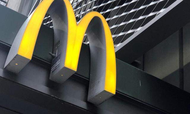 FILE PHOTO: FILE PHOTO: The McDonald's logo is seen outside the fast-food chain McDonald's in New York, U.S., October 22, 2019. REUTERS/Shannon Stapleton/File Photo/File Photo