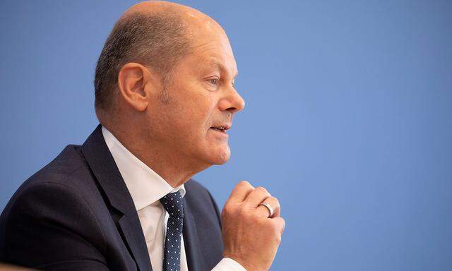 Finanzminister Scholz sieht Negativzinsen als Belastung für private Sparer