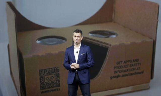 Robert Kyncl, chief business officer for YouTube, talks about the Google Cardboard virtual reality headset kit during a keynote address at the 2016 CES trade show in Las Vegas