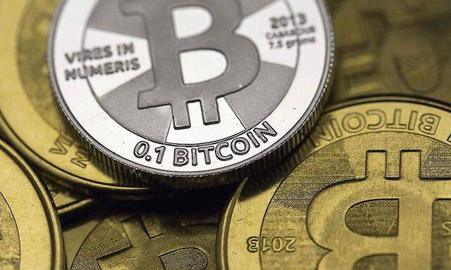 Bitcoin enthusiast Mike Caldwell's coins are pictured at his office in this photo illustration in Sandy