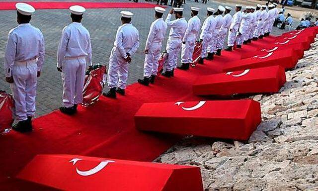 Hamas Navy officers are seen during a ceremony to honor the Turkish people that were killed aboard on