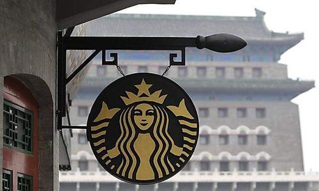 The Starbucks logo is seen in central Beijing