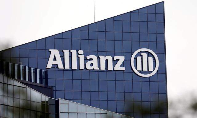 FILE PHOTO: The logo of insurer Allianz SE is seen on the company building in Puteaux at the financial and business district of La Defense near Paris, France