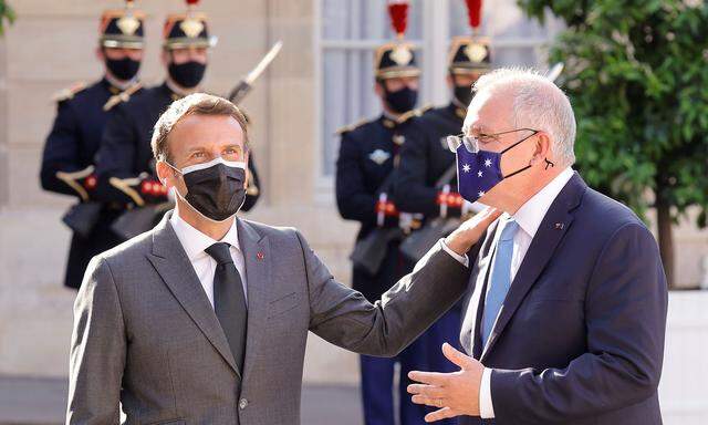 Archivbild. Am 15. Juni war die Stimmung zwischen Frankreich und Australien noch bestens - hier bei einem Besuch Morrisons in Paris bei Macron.